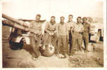 Printed on reverse: "Our gun & crew at Gazala in Libya". Signed Michael Mooney (1943), (likely) pictured far right.
