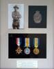 Photograph of framed medal display. Medals have his name &amp; number inscribed. Medallion is a replica as the original is missing. I have the miniature lapel medallion with number inscribed.