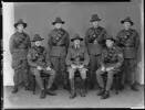 The Tikorangi Troop. Troop Leader and N.C.O.s. Group of seven servicemen. Left to right, standing: Lt Corp E.J. Bevin, Cpl J.D.C. Mason, Cpl Norman Frank Jupp, Cpl Jim Heppell. Seated: Sgt E. S. Bridger, Lt P. H. Surrey,  Lt Sgt W. C. McIver.