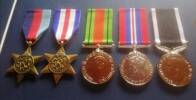 Includes (left to right) the 1939-1945 Star, the France and Germany Star, the Defence Medal, the War Medal 1939-1945, and the New Zealand War Service Medal.