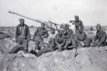 Henry Anderson with group pf fellow soldiers and AA gun