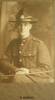 Horace Vernon ASTBURY wearing 1st NZEF uniform, insignia, lemon squeezer and swagger stick.