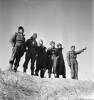 Soldiers of the Maori Battalion study the Tripoli Rd near Azizia (now known as Al Aziziyah), Libya, 10 February, 1943. From left to right: R Reihana (Tu [?]), P Wharepapa (Bay of Plenty), W Johnston (Opotiki), A V Morrison (Ro [?]), J T Harris (North Auckland), T T Daymond (Wellington).