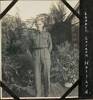 Image of GW Hollard standing in a garden