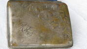 Photograph of the cigarette case my father was presented with and carried with him (and used frequently) during his war service