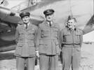 Group of No. 31 Squadron aircrew with a Grumman TBF Avenger.  RNZAF Station, Gisborne 
L-R: Flying Officer S.E. Clayton (navigator), Flight Lieutenant C.G.G. Prior (pilot) and Warrant Officer T.R. Scarlett (air gunner).  This crew was lost in action, 5 June 1944.