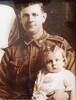 Private Archibald John Lipscombe, with daughter Gwendoline Lipscombe on his lap (prior to embarking in February 1915)