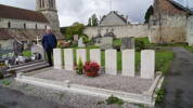 Photograph of Flight Sergeant Michael Cosgrove's nephew, also Michael Cosgrove, at Montchalons Churchyard, Aisne, France. Image kindly provided by Michael Cosgrove (April 2019). Image has no known copyright restrictions.