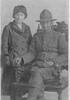 Couple, soldier in uniform D.L Bruce, seated and ?Jean McKee taken 1917 - No known copyright restrictions