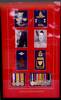Framed display showing the medals, badges, patches and photographs of EJ Williams and GH Williams - No known copyright restrictions