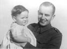 Family photograph, Noel Lempriere in uniform holding his daughter (kindly provided by family) - This image may be subject to copyright