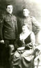 Family group WW1, soldier Jack Hudson on right with his brother, also in uniform, and sister. Photo taken while in UK on Convalescence leave. - No known copyright restrictions