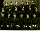 Group photo, WW2, RNZAF formal arrangement: Flight G2, Course 44a on B. Flight Tarmac, Taieri, Dunedin 21.8.43. Back Row : L-R : M. McCready, L. Orbell, A.J. Evert, H.Maddox; L. Lawrence. Middle Row : L-R : A. Hutchinson, F.Hanson, N.Jackson, D.McCabe,Terry Hogan. Front Row : L-R : N. Graham, S. Green, W. Gray, D.Howlett, G? Kelly (kindly provided by family) - This image may be subject to copyright