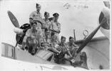 Group: Crew 13, No. 6 (Flying Boat) Squadron, RNZAF, taken at Lauthala Bay, Fiji, dated 7 April 1944. Front Row: Flight Sergeants Ray Lowther (Captain); Al Furness (1st WAG); Graham Rough (1st Engineer); Fred Walker (2nd Engineer); 'Cookie' Cook (3rd Engineer). Back Row: Bill Lamason (2nd Pilot); Joe Garrity (2nd WAG); Claude Baigent (Navigator). - This image may be subject to copyright