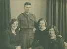 Family photograph, Private Cusack in uniform with mother Bridget and 2 sisters Rose and Anne - This image may be subject to copyright