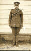 Portrait, standing at attention outside hut, Trentham Camp aged 17 years - No known copyright restrictions