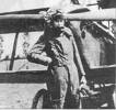 Ronald Burns Bannerman WW1 in flying kit standing in front of propellor - No known copyright restrictions
