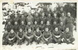 Group of POWs in Stalag XVIIIA, Germany, December 1941, received in New Zealand in January 1942. Vincent Hayes is third from the left in the front row. He is believed to have been the oldest in the group. The others in the photograph have not been identified. - This image may be subject to copyright