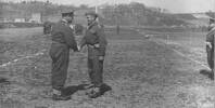 General Freyberg congratulates John Horrocks is moments after pinning the MC. - This image may be subject to copyright