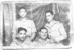 Group, WW2 four 28 (Maori) Battalion soldiers: Ruki Tipene is on the left rear of the picture. - This image may be subject to copyright