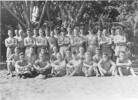 Group photo, Walter Brough, 2nd row, 4th from left, in Radar Unit 57, 62 Squadron, on Rendova Island in 1944. On the back of the photograph is written: LAC WIRELESS OPERATOR RNZAF; WB BROUGH 43611. 4TH FROM LEFT SECOND ROW; comunication [sic] for Radar Unit - This image may be subject to copyright