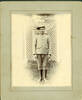 Portrait, Anglo Boer War, soldier standing on grass in front of tall white wood lattice gate and fence William Moffitt (front) - No known copyright restrictions