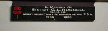 Detail, plaque commemorating Sister Gladys Joan Robertson (63241) beneath the NZ Returned Army Nursing Sisters Assoc. (Ackl) honours board (photo J. Halpin April 2012) - This image may be subject to copyright
