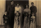Wedding WW2, 1944 a formal photograph of Gordon, his bride and bridal party left to right ?Whiteman, Gordon Hooper (290527), Audrey Hutchins, Gartrell Stone, Freddy Armour (?266594). Flowergirl Alison Wilkins(kindly provided by family) - This image may be subject to copyright
