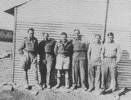 Group photo taken by Douglas Baird. From left: Eric Sisson, Dave McLennan, Douglas (Scottie) Baird, Jock Baigley, Robert Baird and Doug Sisson, all Taihape lads, seen here at Ballbeck, Syria before they headed back to Mersa Matruh. Information from 1894-1994 "give me Taihape on a Saturday night" by Denis Robertson, published by The Heritage Press, Canada. - This image may be subject to copyright