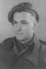 Portrait, Trevor Davidson Morrison with beret and badge - This image may be subject to copyright