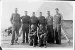 Group, WW2, 8 soldiers standing in front of tent, Egypt?. Back row 2nd from right is Ian Victor Gadsby (42268); family think man kneeling on right is brother Raymond Athol Gadsby (259051) - This image may be subject to copyright