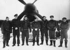 Group, WW2, RNZAF, 7 pilots from 486 Squadron standing with a tempest in winter. Image from Lee Melles collection. Caption from Sortehaug., P. (1998). p.196. Left to right: Cornelius James (Jim) Sheddan, William Alan Liddell (Bill) Trott, Brian John O' Connor, Arthur Ernest (Spike) Umbers, John Edward (Johnny) Wood, Colin James McDonald and William Lister (Dusty) Miller - This image may be subject to copyright