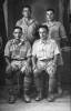 Alfred Housham (sitting on right) with three Ujdur brothers photographed when they were on leave in Cairo. Nicholas Ujdur sitting on the left, Ben Ujdur (killed on active service) standing left rear, and Syd standing right rear - This image may be subject to copyright
