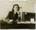 Portrait, seated at a desk in the office (kindly provided by family) - This image may be subject to copyright