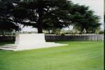 Lijssenthoek Military Cemetery, monument to the fallen with some of the headstones in the background (Photo Mr & Mrs R. Brooker, 1998) - No known copyright restrictions