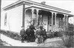 Family group William Winter's family at High Street, Masterton. L-R: Harold Joseph Winter; Frederick William Winter; Marion Winter (nee Sigley); unknown (sitting); Ruby May Winter; unknown (standing); Helmiah Nyle Ronga Winter - No known copyright restrictions