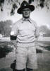 Portrait, WW2, in shorts, hat, jumper and wearing a black arm band below his sergeant stripes (kindly provided by his daughter) - This image may be subject to copyright