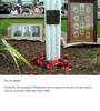 Memorial plaque, Pukekohe East Primary School, framed photographs of 3 men from World War 2 and the larger frame of the 13 men from World War 1; photograph taken at the commemoration service held on 11 November 2004. (photo S Stone) - No known copyright restrictions