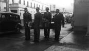 Funeral cortege, pall bearers carrying the coffin on 15 June 1953. The pall bearers are Joseph Davies, Athol McRae, Gerald Bethell and Douglas Harrison (their correct order in the photo is not known). Photo courtesy of W. E. Newberry & Sons, Whangarei - No known copyright restrictions