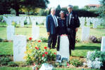 Whanau, left to right, Arthur Kereopa Snee and Susan Te Kaihou Snee, Marau Russell beside Te Kaihou's brother's grave, Florence War Cemetery, taken 27 September 2000 when the 28 Maori Battalion, D Compnay toured Italy (photograph from Arthur Snee) - This image may be subject to copyright