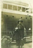 Portrait, WW1, nurse Theresa Butler taken at the end of the war in NZ with a hospital ship in the background. (kindly provided by family) - No known copyright restrictions