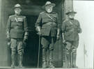 Captain William Palmer with Major Pocock from Canada, Captain Findlater from Australia. Pocock came to start 1st NZ Squadron of the Legion of Frontiersmen - on steps of Auckland Museum - No known copyright restrictions