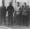 Group photograph, 4 soldiers standing on a street, Ronald Cumber and friends (kindly provided by family) - This image may be subject to copyright