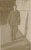 Portrait, WW2, RNZAF, wearing uniform, walking in street, Edward Walter (Ted) Hodder, c1943 (Hodder family photograph) - This image may be subject to copyright