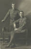 Brothers: Frederick Horace Dolphin, No.3/2055, 2nd NZ Field Ambulance, New Zealand Medical Corps (standing) with his older brother, George Alexander Dolphin No.3/2054, 2nd NZ Field Ambulance, New Zealand Medical Corps c1916 - No known copyright restrictions
