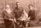 Family photograph, WW1, Archie in uniform, man and woman and child - No known copyright restrictions