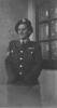 Portrait, Sergeant Betty Morris in uniform, taken in 1947 at the front door of 14 Dundonald Street, Dunedin. - This image may be subject to copyright