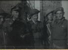 Trieste, 8 May 1945. J. Hallewell (in the centre of the photo) is receiving the surrender from the German officer. - This image may be subject to copyright