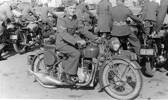 Group, soldiers on motor bikes, Jack Courtenay in foreground, 1941 (kindly provided by M. Prictor) - This image may be subject to copyright