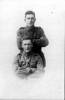 Group: Two soldiers, John Budge (standing) and another (identity unknown) in uniform. - No known copyright restrictions